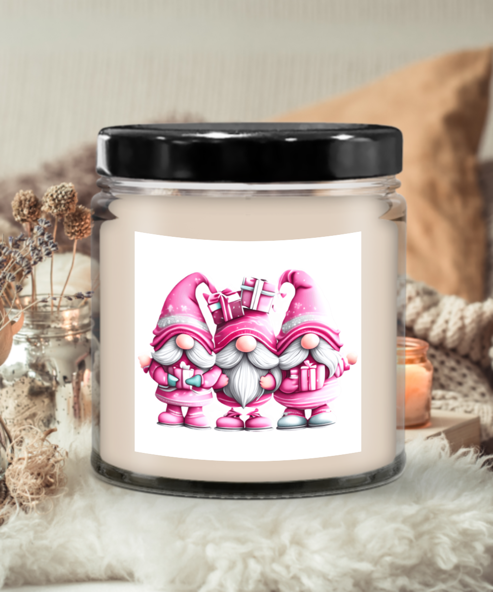 3 pink knomes dressed for christmas with presents candle warmth glow good luck merry christmas happy holidays gift